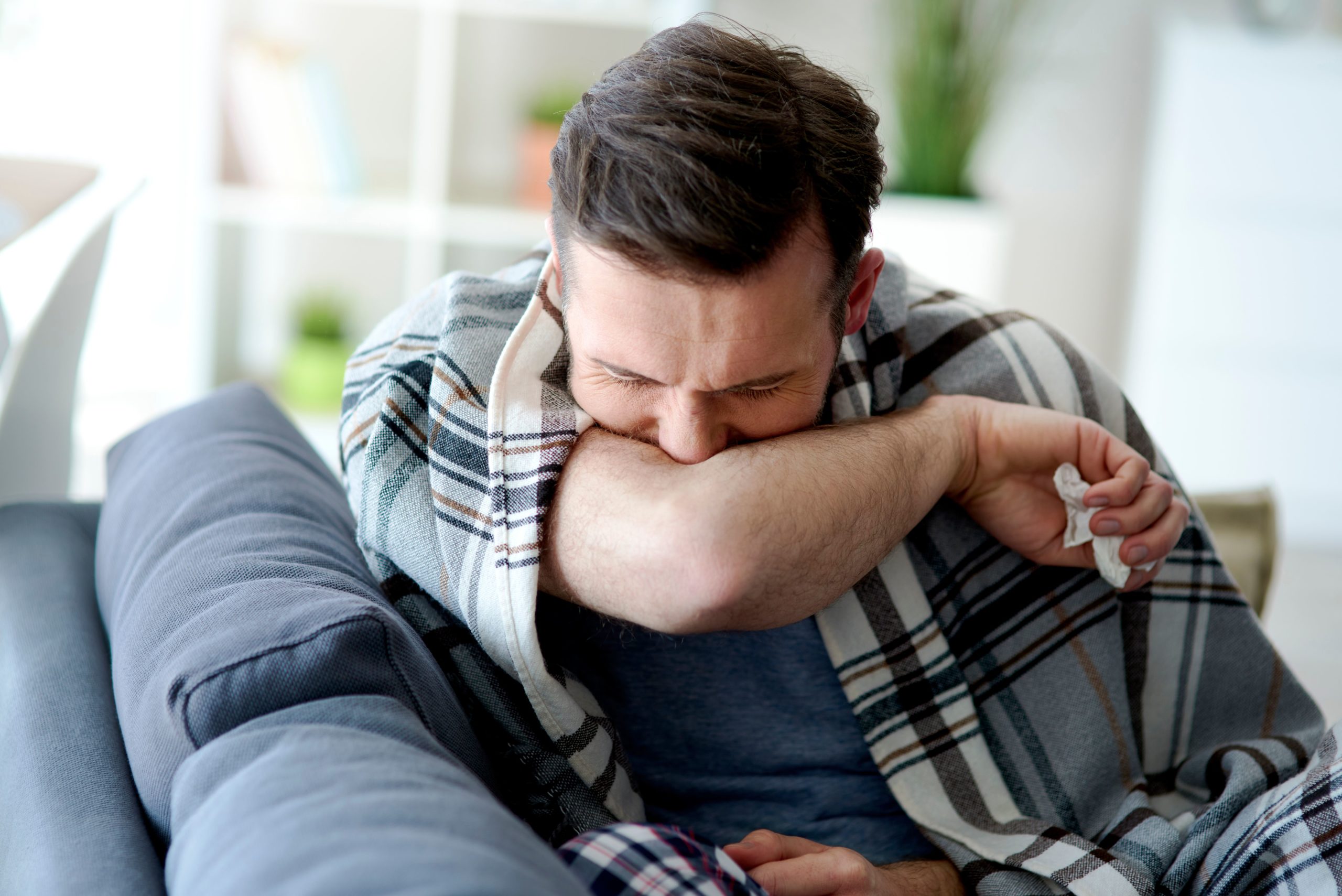 man coughing in his elbow 2021 08 27 16 32 52 utc man coughing in his elbow 2021 08 27 16 32 52 utc